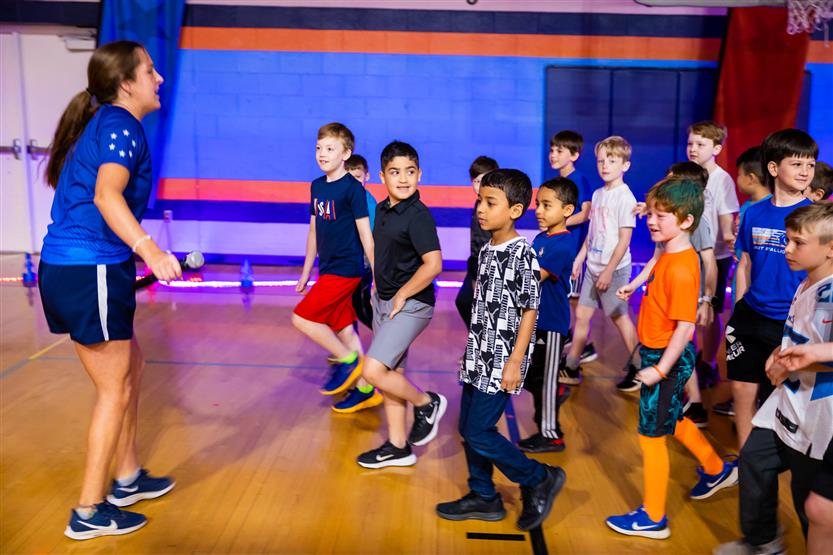 Students and families participate in a fun run